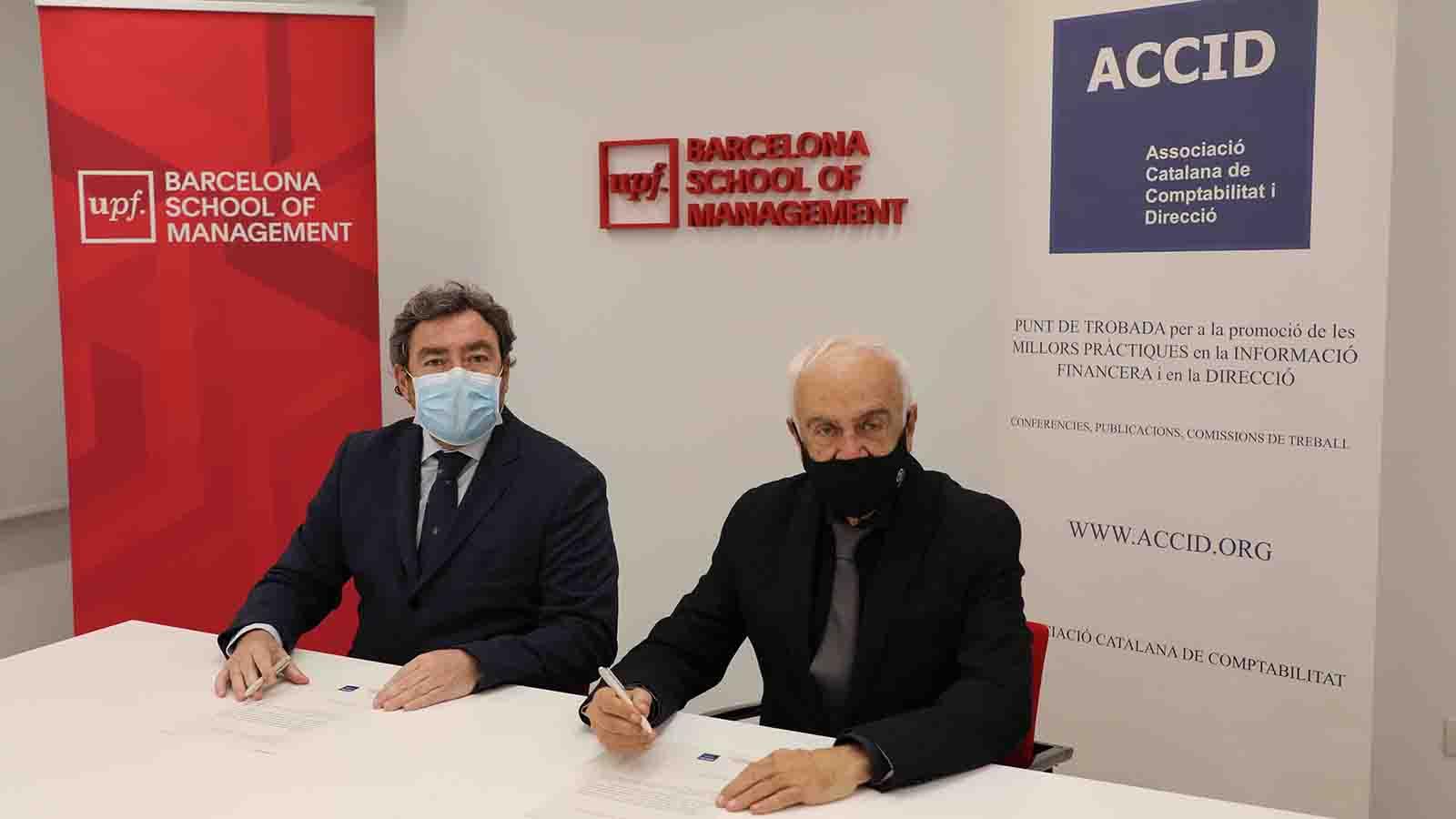 El director general de la UPF-BSM, José M. Martínez-Sierra, i el president de l'ACCID, Daniel Faura.